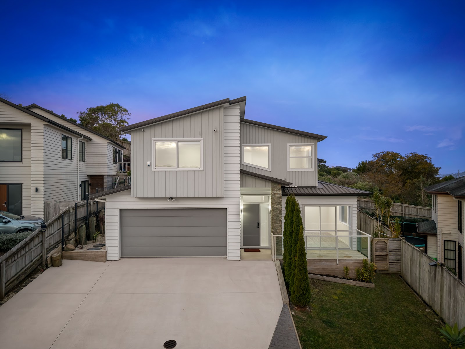 Contemporary home at dusk in Orewa